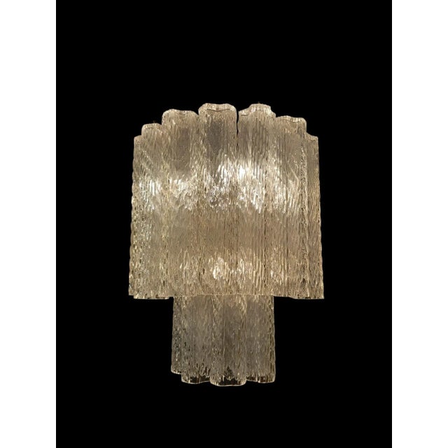 Glass ceiling lamp with a chromed metal stand. Reminiscent of the Tronchi model, made by the famous Murano glassworks in...