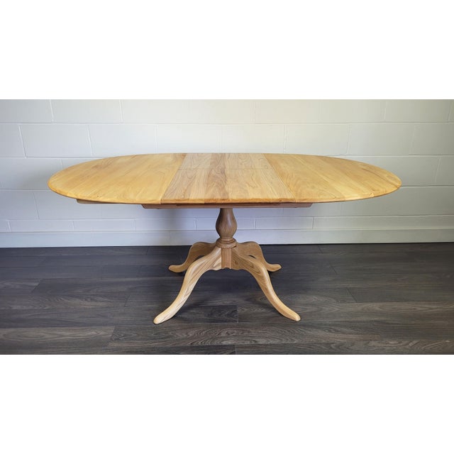 Chester Extendable Pedestal Dining Table from Ercol, 2000s, in Restored conditions. Designed from 2000 This piece has an...