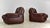 A pair of 1970's era post modern leather lounge chairs in the style of Mario Marenco. Compact and plush these chairs...