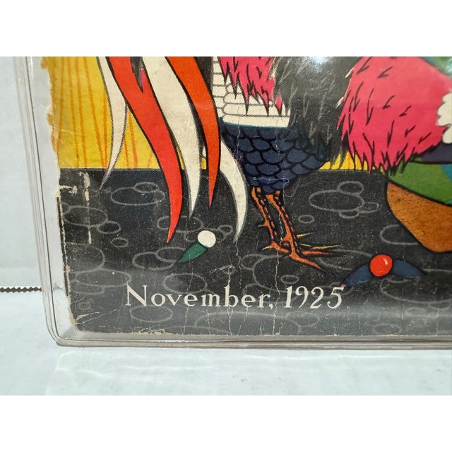 Original period front cover from the November 1925 issue of Asia magazine, featuring a traditionally dressed figure...