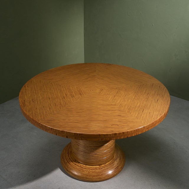 Circular dining or center table by the Italian sculptor Pino Pedano. The table is made with a pentagonal pattern with...