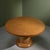 Circular dining or center table by the Italian sculptor Pino Pedano. The table is made with a pentagonal pattern with...