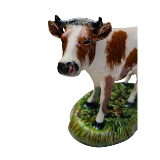 19th Century Rare Large French Majolica Cow. signed Ed. Posteaux. Height / 8.5 inches. W / 12 inches.