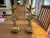 Pair of vintage solid brass candleholders featuring an elegant Asian-inspired design with geometric and sculptural...