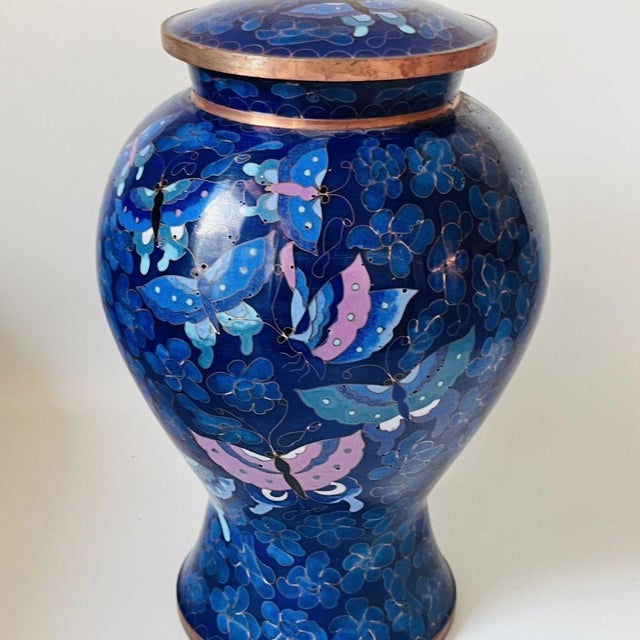 This beautiful, baluster-shaped ginger jar is crafted in the traditional cloisonné enamel technique. The exterior features...