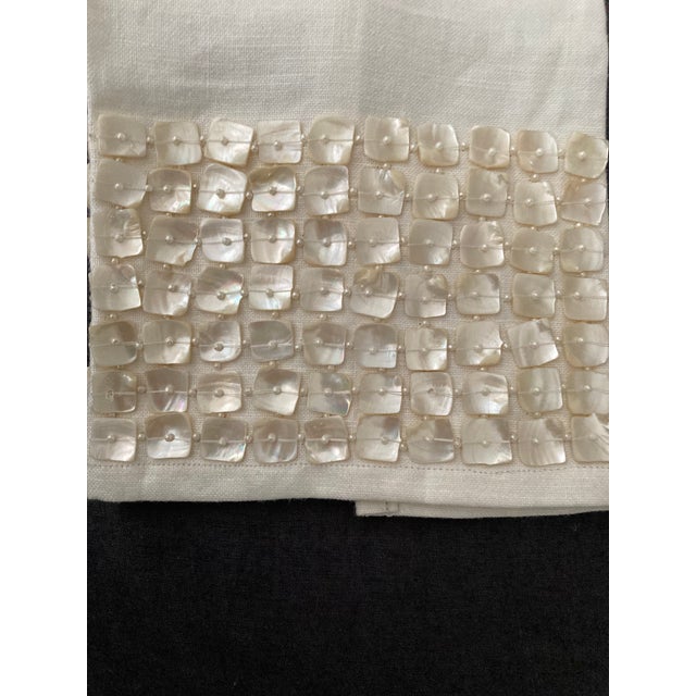 These Mother of Pearl Embellished Linen Contemporary Guest Towels are a luxurious addition to any bathroom. The set of 2...