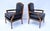 A pair of late 20th Century Louis XVI style plush leather Fauteuils with carved walnut frames & brass tack detailing....