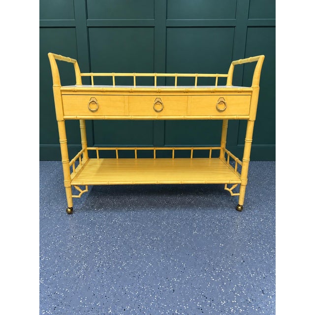 Striking vintage Thomasville Allegro rolling serving cart featuring the collection’s signature faux-bamboo detailing and...