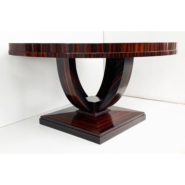 Art Deco Macassar Ebony Round Dining Center Table, Beautifully Veneered Wood Offered for sale is a wonderful round...