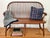 Traditional hardwood Windsor-style bench, based on a classic Pennsylvanian Dutch design and finished medium cherry tone....