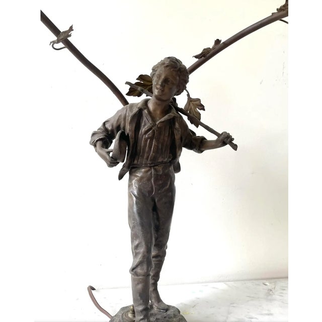 Rare bronze Spelter lamp. Made in Paris, France circa the late 19th century. Signed and stamped. Beautiful working condition.