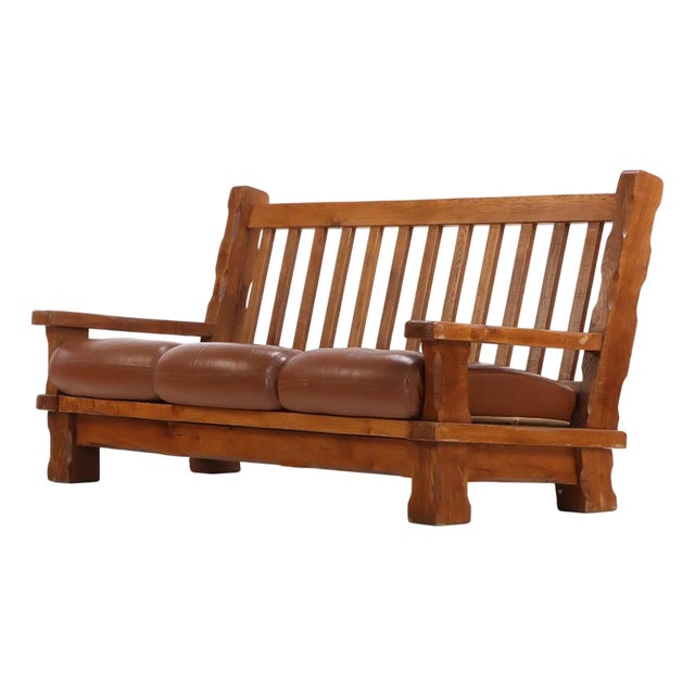 A French Heavy Oak Brutalist Style Open Arm Sofa, C. 1960. For Sale