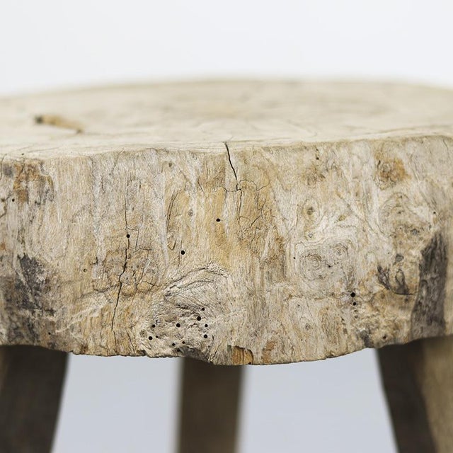This primitive pine stool, once purely functional and designed solely for sitting, has now evolved into a strikingly...