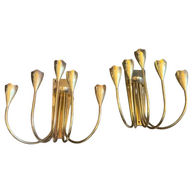 These exquisite wall sconces, dating from the 1940s, capture the refined elegance and sculptural fluidity characteristic...