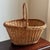 A lovely traditional farmhouse gathering basket, circa mid-20th century. Love the pretty french randing and warm, aged...