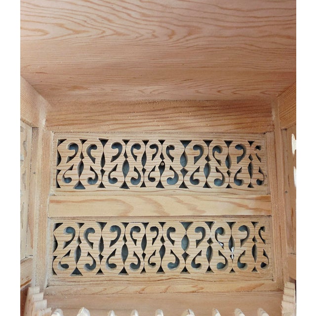 Showcasing the beauty of traditional Moroccan craftsmanship, this handmade wooden wall shelf features an elegant natural...