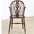 A handsome mid-19th century English elm wheelback Windsor chair that is solid and surprisingly comfortable. Hand-crafted...