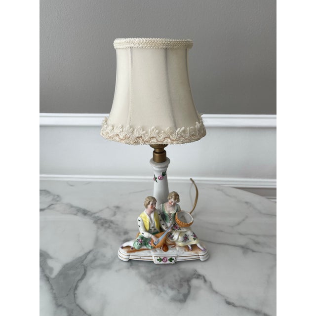Bring charm to any room with this Romantic Aristocratic couple. Measures 6 1/2 inch L x 14 inch H to top of shade. 6 foot...