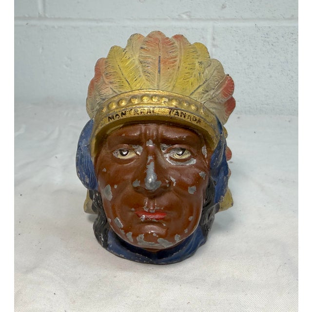 This rare antique Native American Indian Chief white metal still bank is a unique and collectible piece originating from...