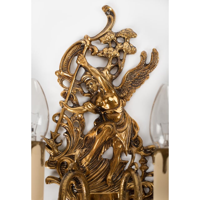 Spectacular and Exceptionally Luxurious Pair of 1950s Spanish Empire Style Cast Brass 2-Light Wall Sconces. A true...