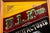 Early 20th-century reverse-painted glass advertising sign for H.L. Kuter of Shannon, Illinois, a manufacturer and dealer...