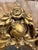 A large girandole gold gilt antique French mirror. Elaborately decorated frame, with egg and dart mouldings, C scrolls and...
