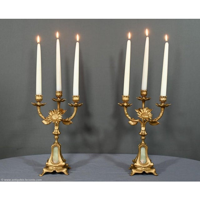 This pair of three-light candelabra, dating from 1940, is a remarkable example of the decorative art of the period. Made...