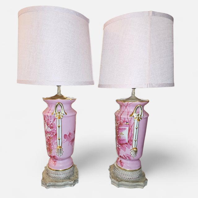 This gorgeous pair of table lamps is in style of French Old Paris design. Each porcelain lamp is in baluster form with...