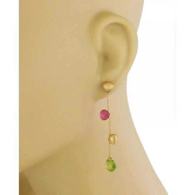 From the Aruba Collection by Marco Bicego never fail to satisfy his clients, this elegant authentic pair of dangle...