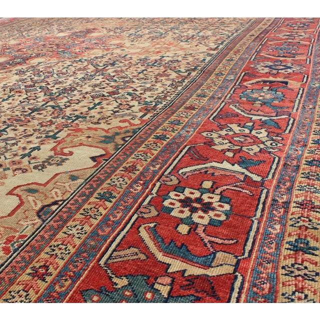 Textile Antique Persian Sultanabad With Medallion in Yellow Cream, Blue Red and Green For Sale - Image 7 of 9