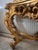 20th-century Italian Baroque console table with mirror with beige marble top Fully carved and in good condition Well-...