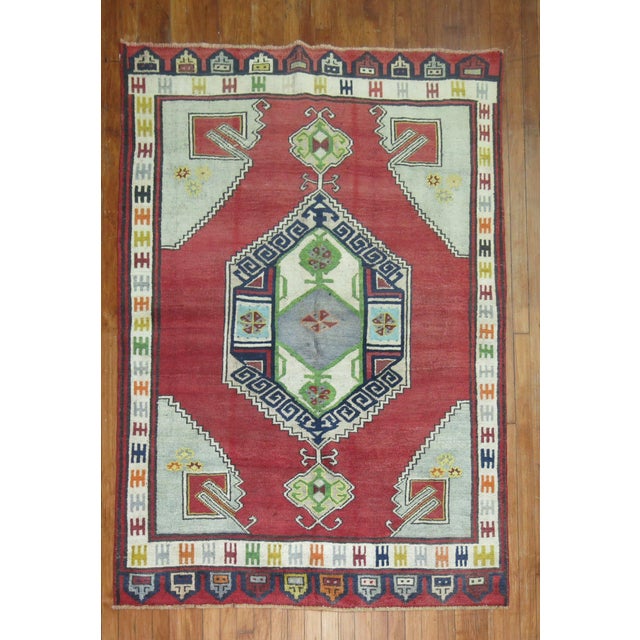 A mid 20th-century Turkish Konya Rug Measures: 4'6'' x 6'4''.