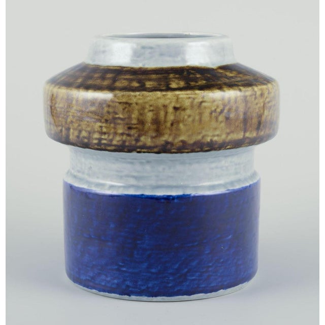 Olle Alberius for Rörstrand, Sweden. "Titus" ceramic vase made of stoneware. Hand-painted. Glaze in blue, gray, and ochre...