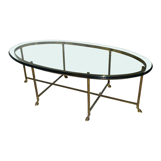1970s Hollywood Regency Mastercraft Brass Hoof Feet Coffee Table Racetrack Glass Top For Sale