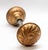 This Vernacular style bronze pinwheel entry door knobs were made by Corbin in 1895. It is part of the E-10200 group. This...