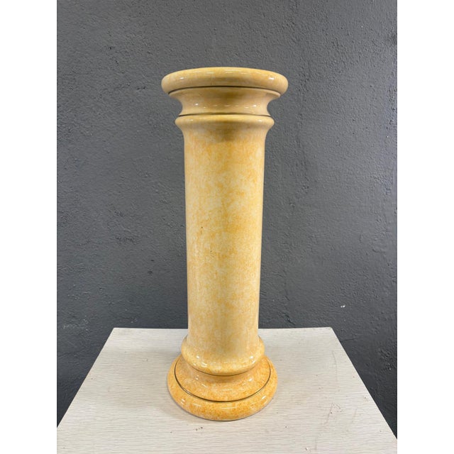 Elegant decorative glazed ceramic pedestal column featuring a refined classical-inspired silhouette and a striking marbled...