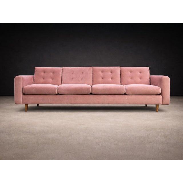 This rare four-seat Rectangular sofa was designed by Joaquim Tenreiro and produced in Brazil during the 1950s, a decisive...