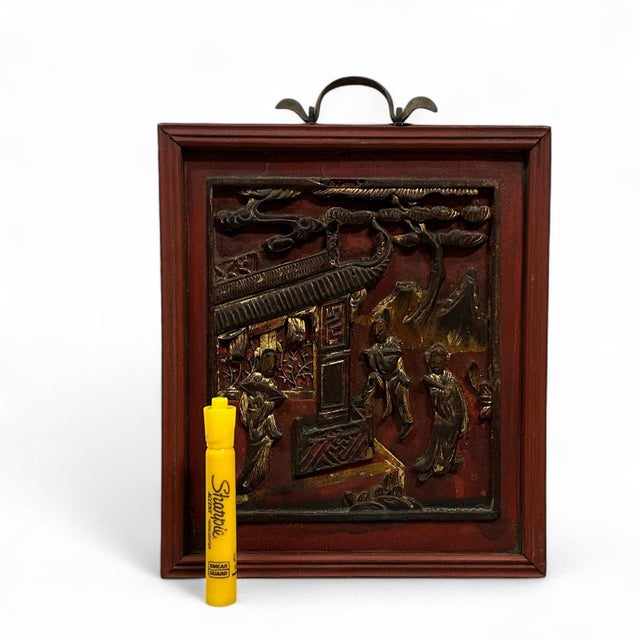 An antique Chinese carved and gilded wood panel set in wooden frame. The age is estimated late Qing Dynasty or late 19th...