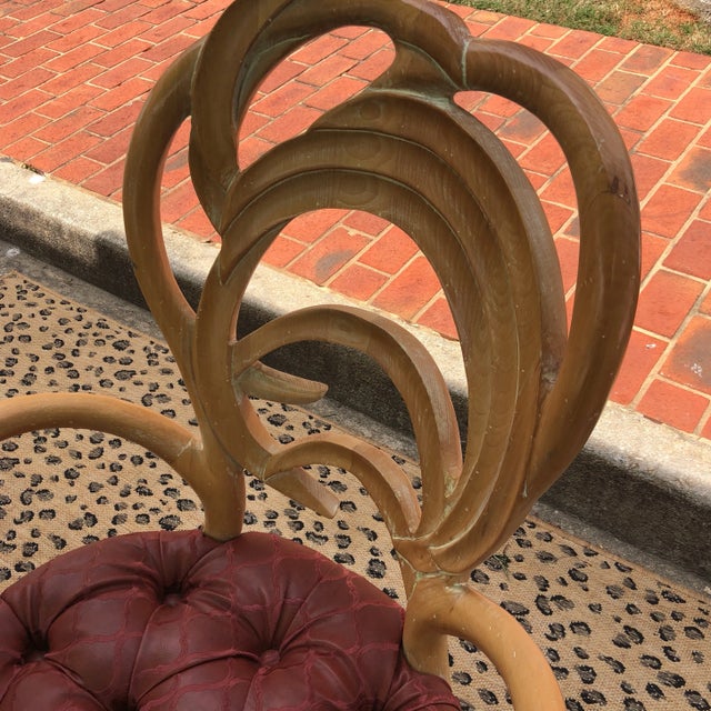 Beautiful wooden art nouveau style chairs with leaf details. Floor to seat is 17 inches with tufted burgundy pattern on...