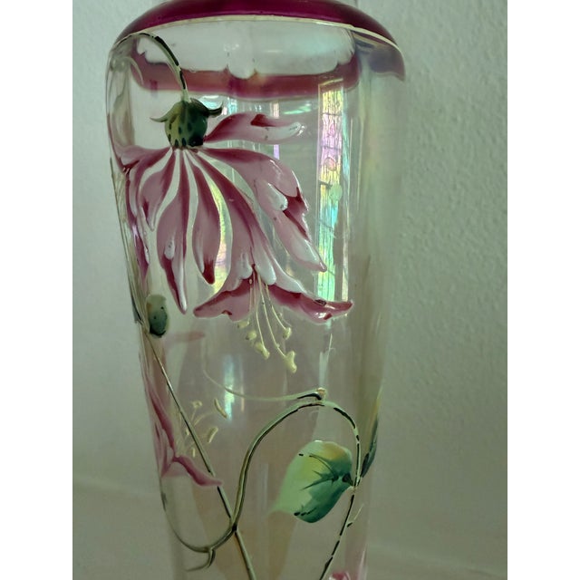 Beautiful iridescent hand blow glass vase. The antique vase dates from the late nineteenth century and is expertly hand...