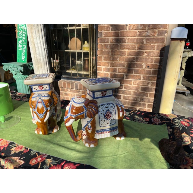 Up for consideration is a beautiful pair of ceramic elephant plant stands. These would look lovely in your home and they...