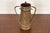 A gorgeous Arts & Crafts period Russian three-handled hammered copper and brass large vase or tankard with applied...