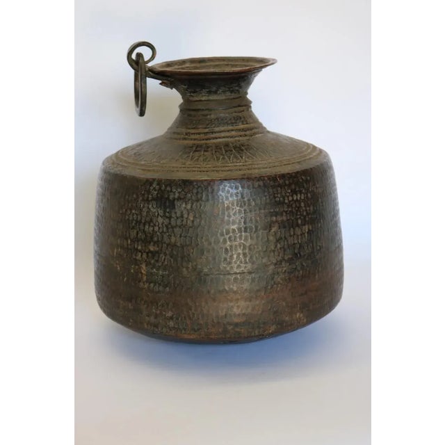 hammered copper water container from India. 1910