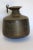 hammered copper water container from India. 1910