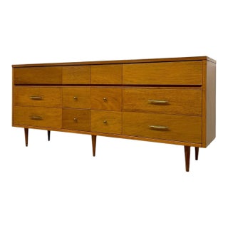 Vintage Mid Century Modern Credenza Dresser With 12 Drawers, Tapered Legs and Brass-Toned Hardware For Sale