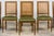 Early 20th century French dining chairs sourced in Paris, executed in the Louis XVI style and crafted from solid walnut....