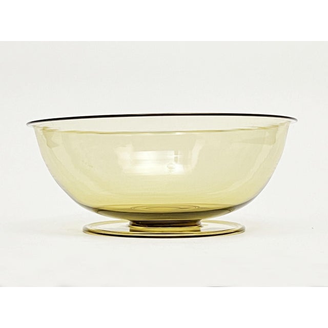 The Murano glass bowl is distinctly reminiscent of the bowl by Vittorio Zecchin presented by Cappellin and Venini at the...