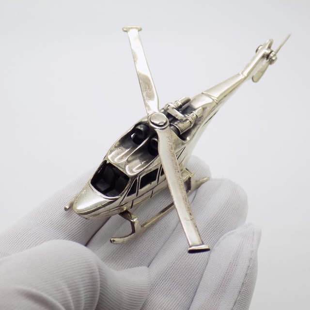 Vintage sculpture with a technical, display worthy character, depicting a military helicopter, handcrafted in italy...