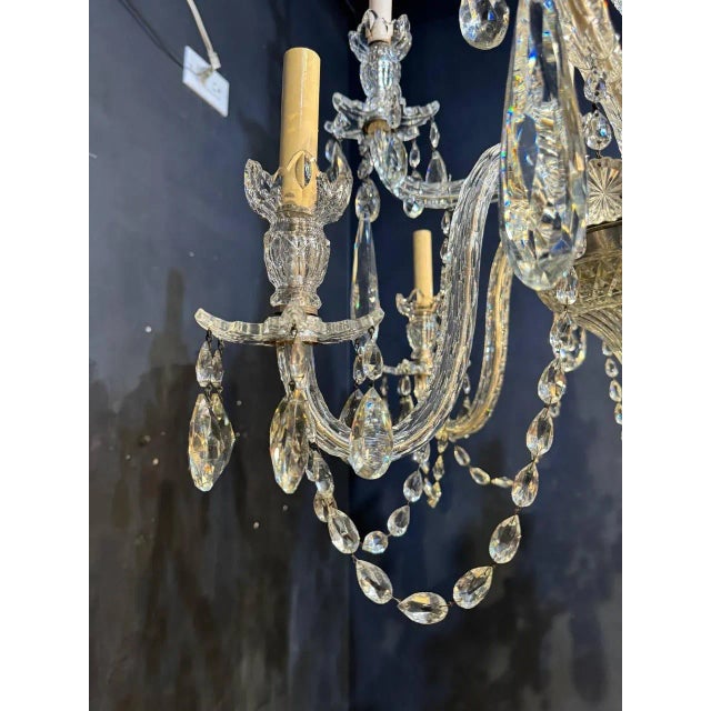 A circa 1900's cut crystal 10 lights chandelier with unusual 5 long crystal drops. Mint condition