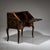 Small Baroque fall-front secretary on elegantly curved S-shaped legs, featuring four drawers and a central cabinet door....